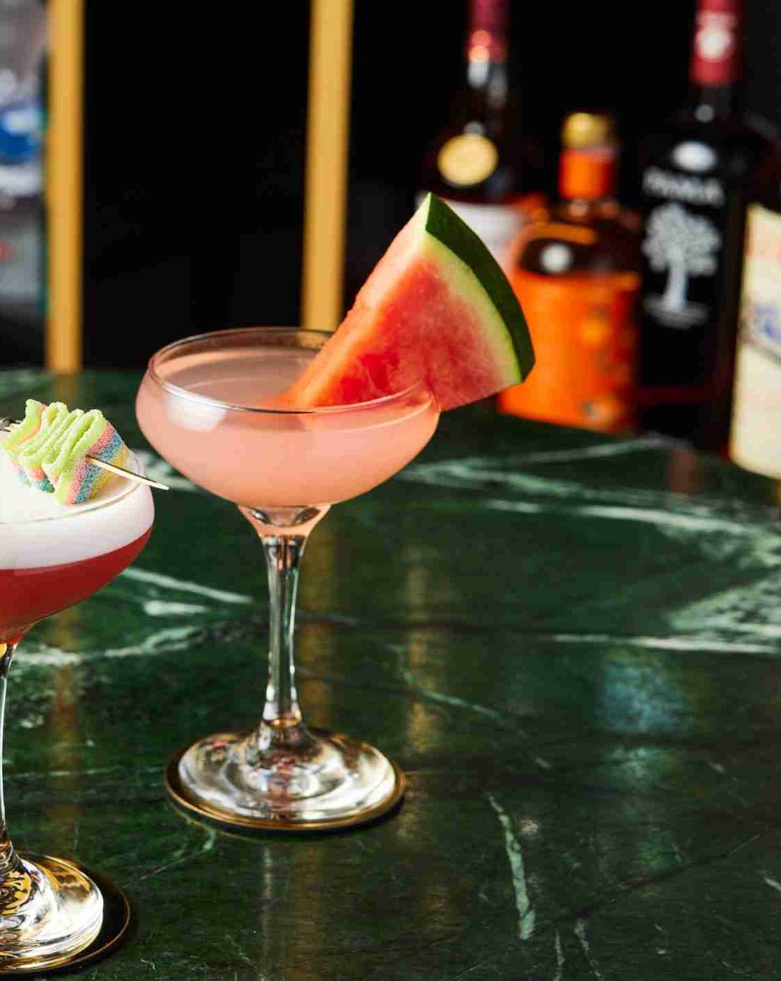 Delicious Cocktails on a green background