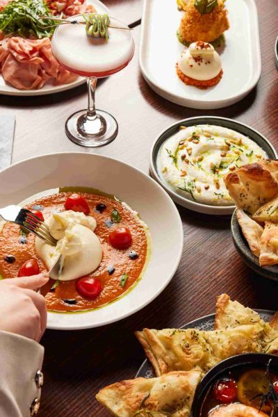 Burrata Caprese dish using That's Amore Cheese burrata