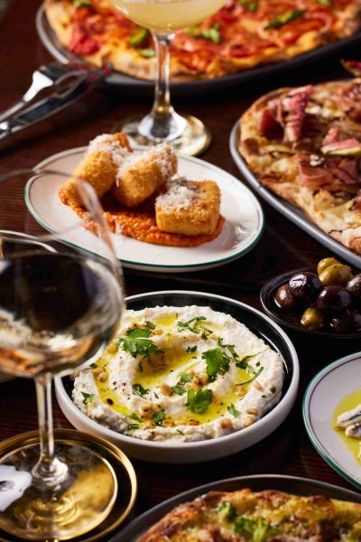 Whipped buffalo ricotta dip with nonna’s lasagna fritta and glass of wine